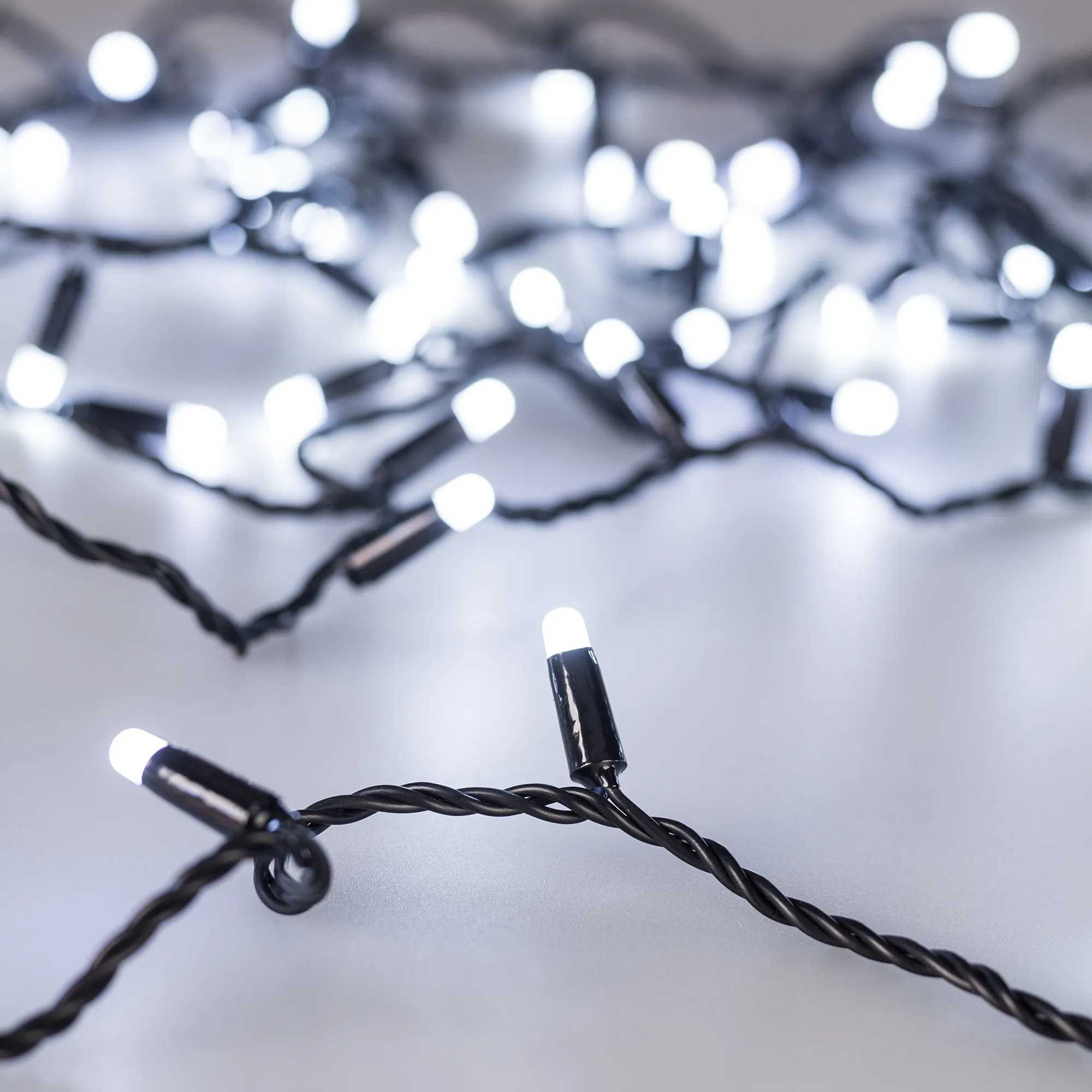 Светодиодная гирлянда ARD-STRING-CLASSIC-10000-BLACK-100LED-MILK-STD White (230V, 7W) (Ardecoled, IP65) - изображение товара